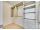 Walk-in closet features custom shelving and drawers at 4023 Home Grown Way, Lake Wylie, SC 29710