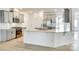 Modern kitchen with white countertops, stainless appliances, and gray cabinets with bar top seating at 4023 Home Grown Way, Lake Wylie, SC 29710