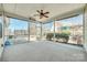 Covered screened porch with ceiling fan and views of backyard at 4023 Home Grown Way, Lake Wylie, SC 29710