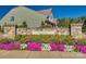 A decorative stone sign announces Summerhouse with colorful blooming flowers along the bottom at 4023 Home Grown Way, Lake Wylie, SC 29710