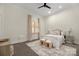 Comfortable bedroom with plush bedding and city views at 127 Tryon N St # 503, Charlotte, NC 28202