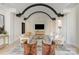 Elegant living room with arched ceilings and modern furniture at 127 Tryon N St # 503, Charlotte, NC 28202