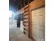 Individual horse stall with ladder access to hayloft at 1409 Trinity Church Rd, Monroe, NC 28112