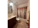 Full bathroom with tub shower combo and updated vanity at 1409 Trinity Church Rd, Monroe, NC 28112