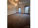 Bright bedroom with two windows and wood flooring at 1409 Trinity Church Rd, Monroe, NC 28112