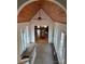 Bright entryway with vaulted ceiling and view to the dining room at 1409 Trinity Church Rd, Monroe, NC 28112