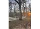 White post and rail fence borders the property at 1409 Trinity Church Rd, Monroe, NC 28112