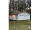 Detached two-car garage with extra storage space at 1409 Trinity Church Rd, Monroe, NC 28112