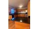 Spacious kitchen featuring granite countertops and oak cabinets at 1409 Trinity Church Rd, Monroe, NC 28112