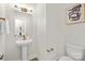 Modern bathroom with pedestal sink and gold accents at 2040 White Cypress Ct # Kh09, Charlotte, NC 28216