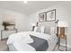 Bright bedroom with a comfy bed and stylish decor at 2040 White Cypress Ct # Kh09, Charlotte, NC 28216