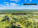 Aerial view of a house and surrounding neighborhood, showcasing its location and proximity to other homes at 1025 Bethel Church Rd, Lincolnton, NC 28092