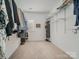 Walk in closet with ample shelving and hanging space at 121 Canvasback Rd, Mooresville, NC 28117