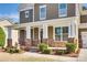 Inviting front porch with stone pillars, providing a welcoming entrance to the home at 16840 Rudence Ct, Charlotte, NC 28278