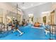 Home gym with various equipment including a sauna at 4231 Fox Brook Ln, Charlotte, NC 28211