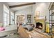 Bright office with fireplace, built-ins and view into bedroom at 4231 Fox Brook Ln, Charlotte, NC 28211