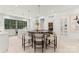 Modern kitchen with gray cabinets, marble countertops, and a center island at 4231 Fox Brook Ln, Charlotte, NC 28211