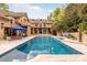 Resort-style backyard oasis featuring a large swimming pool at 4231 Fox Brook Ln, Charlotte, NC 28211