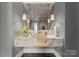 Modern powder room with floating vanity and designer sink at 4231 Fox Brook Ln, Charlotte, NC 28211