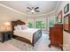 Spacious bedroom with large windows and wood flooring at 7954 Rolling Creek Ct, Charlotte, NC 28270