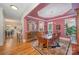 Formal dining room with hardwood floors and a coffered ceiling at 7954 Rolling Creek Ct, Charlotte, NC 28270