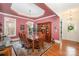 Elegant dining room featuring hardwood floors and a statement wall at 7954 Rolling Creek Ct, Charlotte, NC 28270