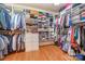 Large walk-in closet with ample shelving and hanging space at 7954 Rolling Creek Ct, Charlotte, NC 28270