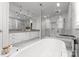 Elegant bathroom featuring a freestanding tub and walk-in shower at 1446 Queens W Rd, Charlotte, NC 28207