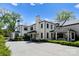 Modern home with white brick exterior and covered patio at 1446 Queens W Rd, Charlotte, NC 28207