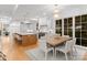 Bright kitchen with an eat-in area, island, and modern cabinetry at 1446 Queens W Rd, Charlotte, NC 28207