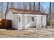 White workshop with lattice-covered porch at 3305 Cameo Trl, Gastonia, NC 28056