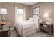 Bedroom with a full-size bed and pink bedding at 411 Moondance Dr, Gastonia, NC 28054