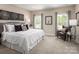 Main bedroom with king-size bed and sitting area at 411 Moondance Dr, Gastonia, NC 28054