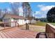 A delightful backyard with a spacious deck and a detached garage, perfect for outdoor living at 416 Linsbury Ct, Gastonia, NC 28056