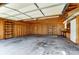 Interior view of the detached garage featuring unfinished walls and concrete floor at 416 Linsbury Ct, Gastonia, NC 28056