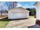 View of a large detached garage and driveway at 416 Linsbury Ct, Gastonia, NC 28056