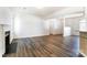Spacious, open living space featuring hardwood floors and a cozy fireplace at 416 Linsbury Ct, Gastonia, NC 28056