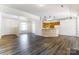 Bright, open floor plan featuring hardwood floors seamlessly connecting the living spaces at 416 Linsbury Ct, Gastonia, NC 28056