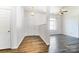 Inviting living area with hardwood floors and neutral colors; ready for your personal touch at 416 Linsbury Ct, Gastonia, NC 28056