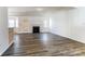 Open floor plan with hardwood floors, fireplace, and lots of natural light at 416 Linsbury Ct, Gastonia, NC 28056
