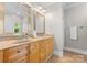 Bathroom with a double vanity, granite countertops, and wood cabinets at 156 Marietta Rd, Mooresville, NC 28117