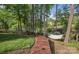 Picturesque walkway to the lake with hammock for relaxation at 156 Marietta Rd, Mooresville, NC 28117