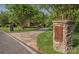 Stone pillar with house number at entrance to a paver driveway leading to the home at 156 Marietta Rd, Mooresville, NC 28117