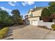 View of the large home with attached two car garage and expansive driveway at 4145 Cindy Ln, Denver, NC 28037