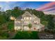 Spacious waterfront home with multi-level decks and patios for enjoying stunning lake views and outdoor living at 4145 Cindy Ln, Denver, NC 28037