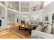 Spacious living room boasts high ceilings, hardwood floors, and an open floor plan at 4145 Cindy Ln, Denver, NC 28037