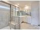 Main bathroom with double vanity, large shower, and tile flooring at 4469 Doyle Ridge Rd, Maiden, NC 28650