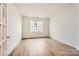 Bright bedroom with hardwood floors and large window at 4469 Doyle Ridge Rd, Maiden, NC 28650