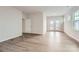 Spacious bonus room with hardwood floors and double doors leading to a balcony at 4469 Doyle Ridge Rd, Maiden, NC 28650