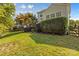 Landscaped backyard with wooden fence at 9826 Edinburgh Ln # 282, Charlotte, NC 28269